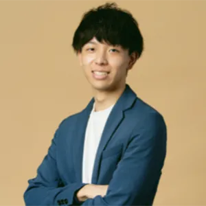 紺色ジャケットを着た男性のプロフィール写真